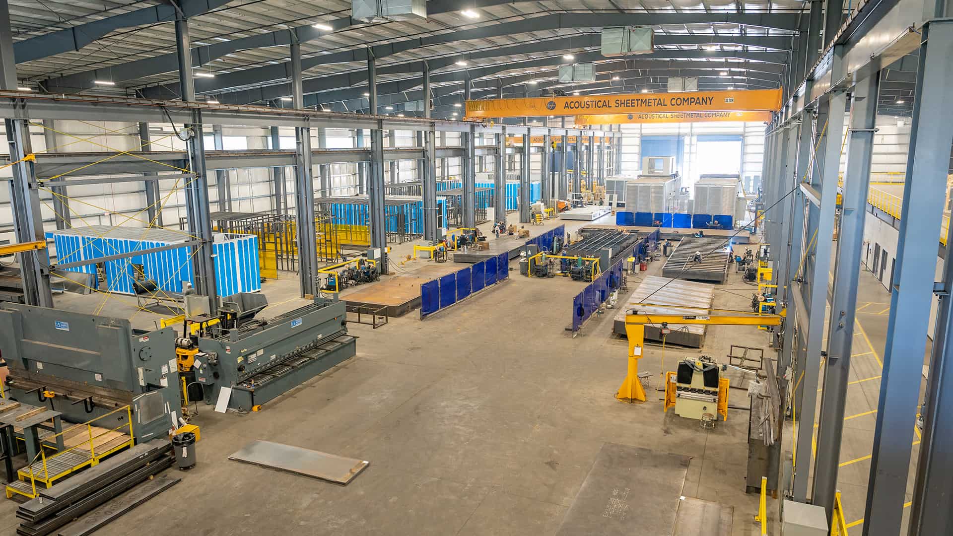 interior wide shot of Acoustical Sheetmetal Company Hudome Way manufacturing facility