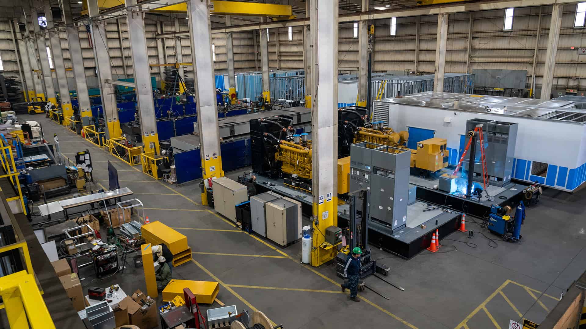 interior wide shot of Acoustical Sheetmetal Company Production Road manufacturing facility